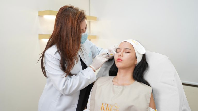Client receiving under-eye filler treatment at KKC Clinic