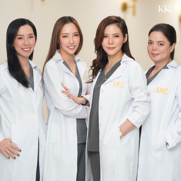 From left to right: Dr. Karn Limbanyen, Dr. Woravan Techasomboon, Dr. Khongkwan Fujitnirun, and Dr. Chantamon Laochariyakul—founding doctors of KKC Clinic wearing white coats and smiling.